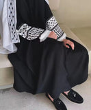 Keffiyeh style abayah robe flared sleeves