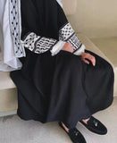 Keffiyeh style abayah robe flared sleeves
