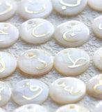 Arabic letters charm on shells