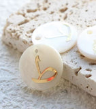 Arabic letters charm on shells